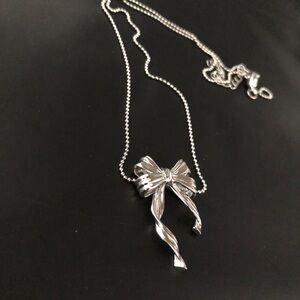 Elegant Silver Bow Necklace